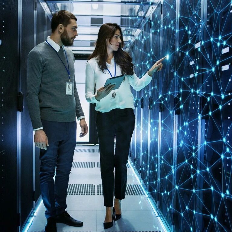 woman with man in It room